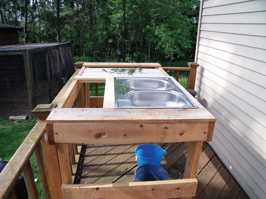 Chris Clampett’s husband converted a homemade table into this garden work station after reading “Keeping Up with Your Garden” by Barbara Pleasant.